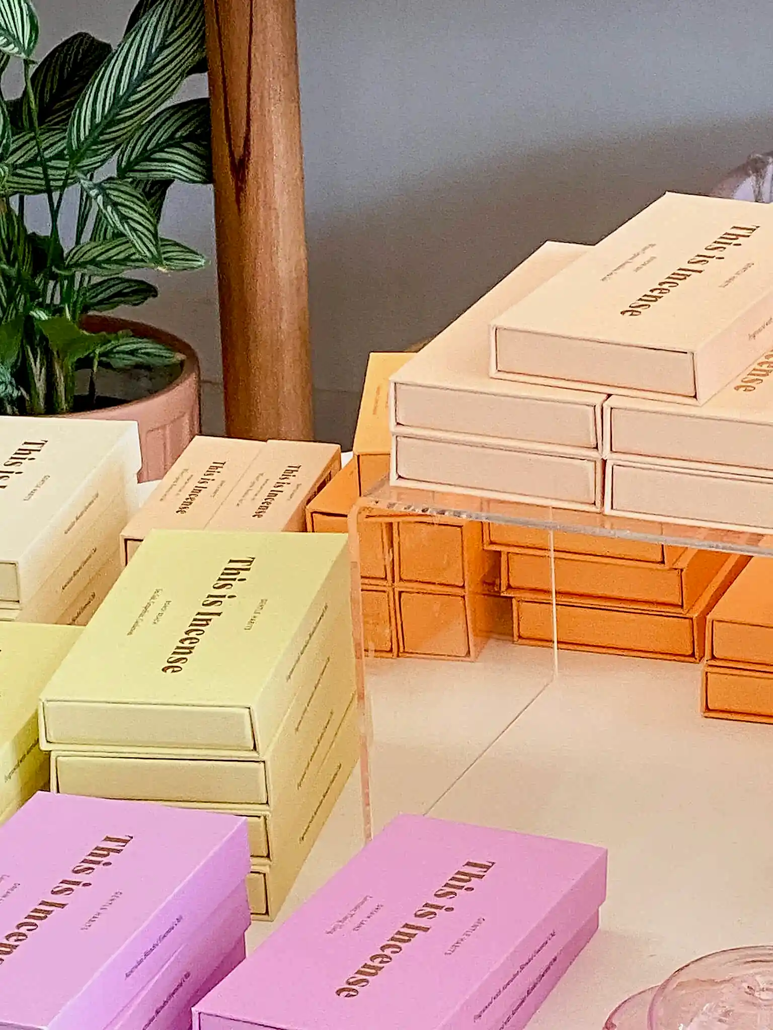 Stacked pastel-colored boxes labeled 