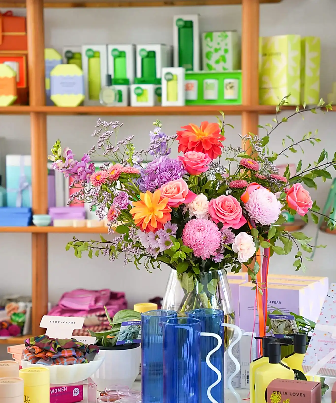 A vase of flowers in a retail store - Poppy Rose Flowers Brisbane