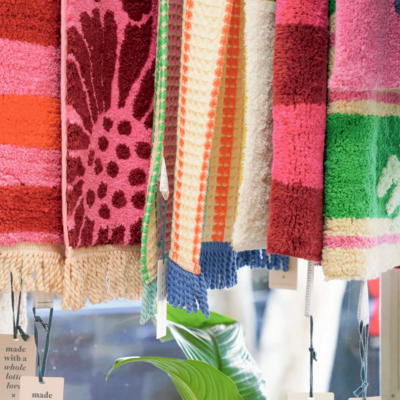 Bath Mats hanging in the window of Poppy Rose Florist in Brisbane