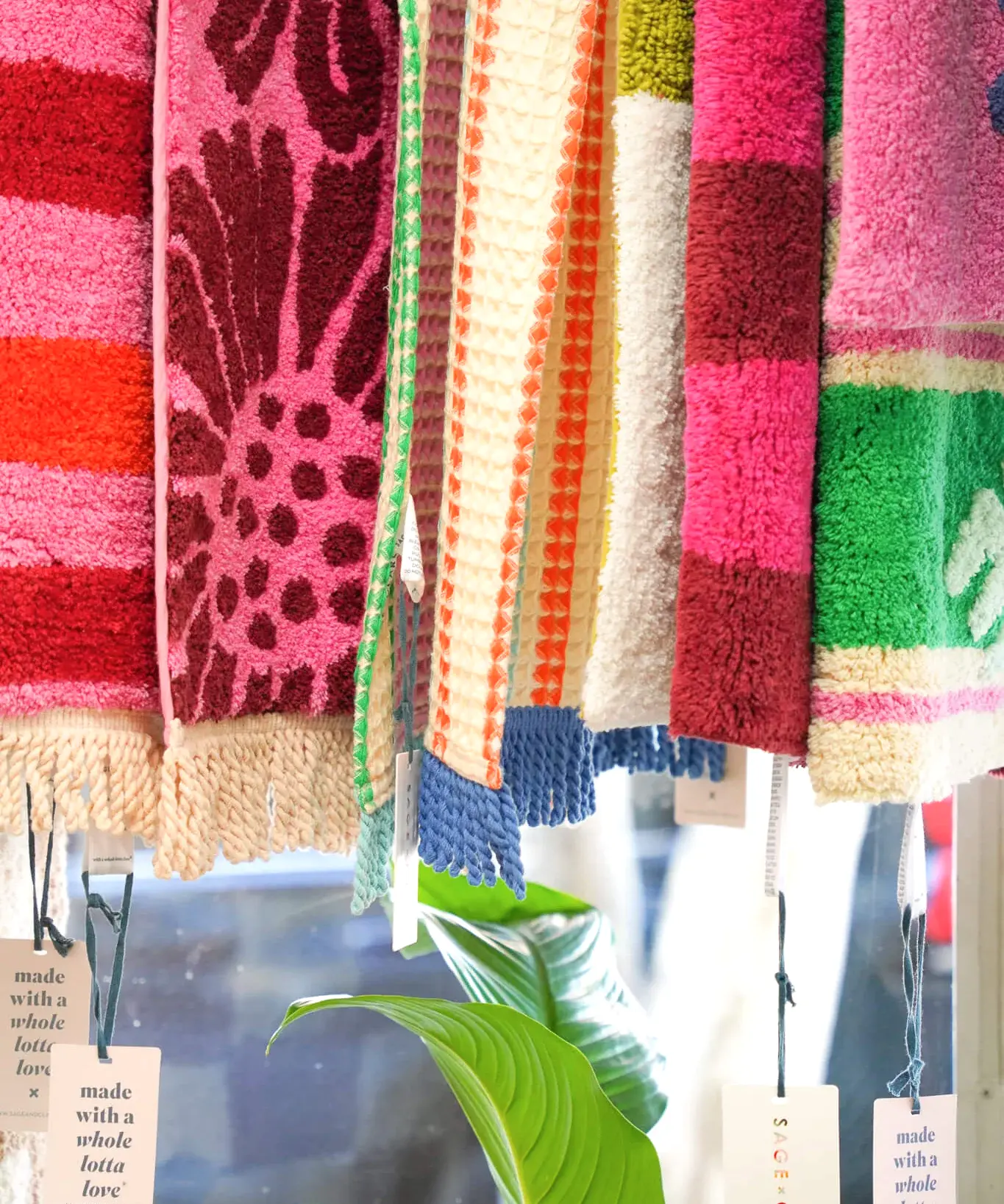 Bath Mats hanging in the window of Poppy Rose Florist in Brisbane