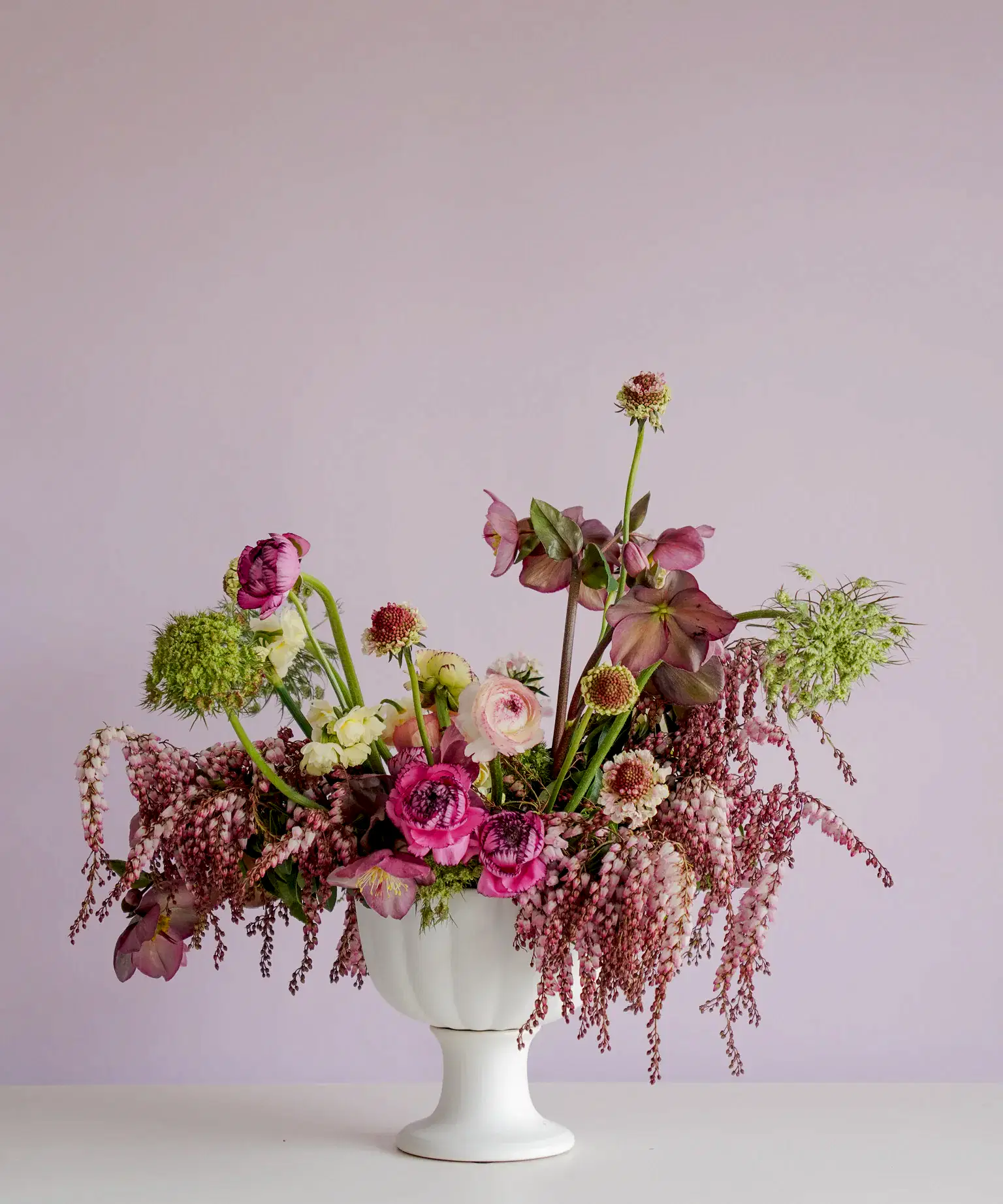Deep moody florals made into a compote for an event by Poppy Rose Flowers in Brisbane