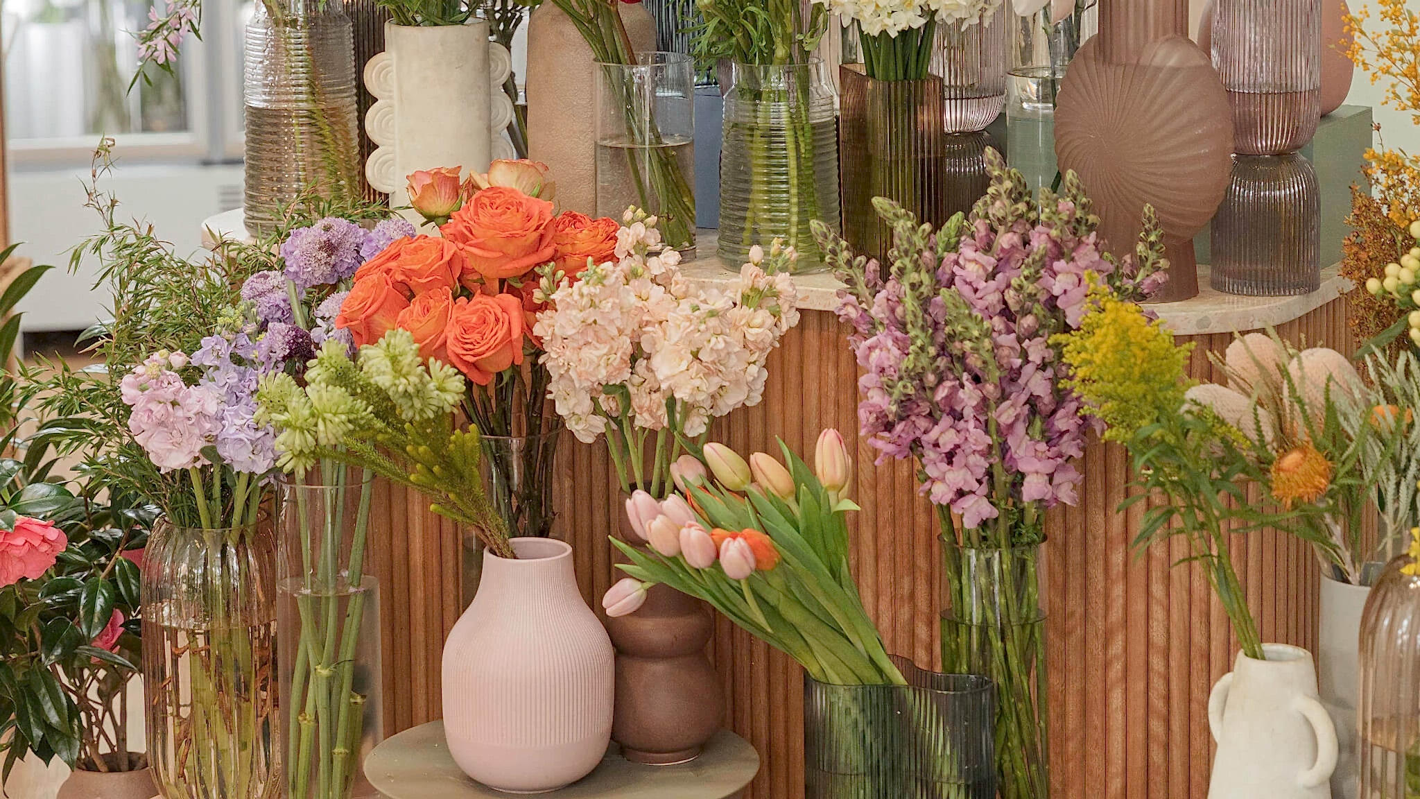 Flowers in vases in Poppy Rose Flowers retail store in Brisbane